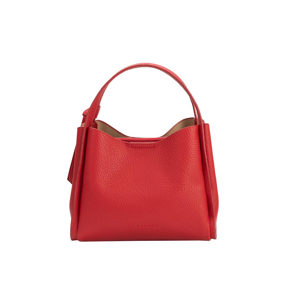 The Felicity Red Recycled Vegan Top Handle Bag boasts a textured surface, crafted from recycled vegan leather. It has a curved top opening, a wide handle, and the brand "JILL BENT" embossed at the bottom. The beige interior lining enhances its minimalist elegance.