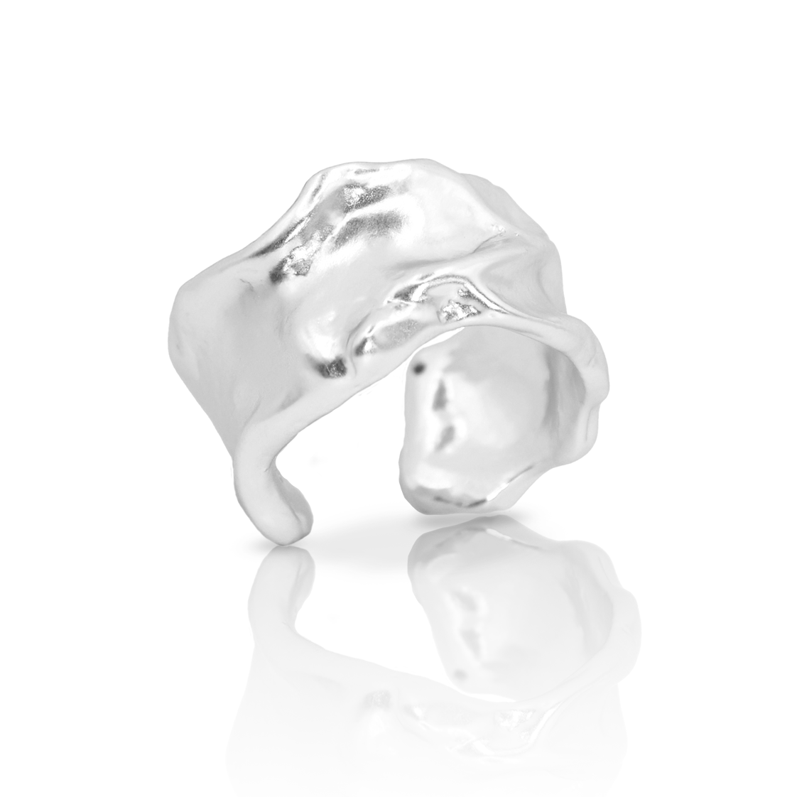 The Crumpled Foil Ring, with its shiny and irregularly shaped silver design, is showcased against a white background. Its smooth yet uneven surface boasts an organic, fluid appearance. Its adjustable nature highlights various curves and contours with a reflective quality that creates a sophisticated and modern aesthetic.