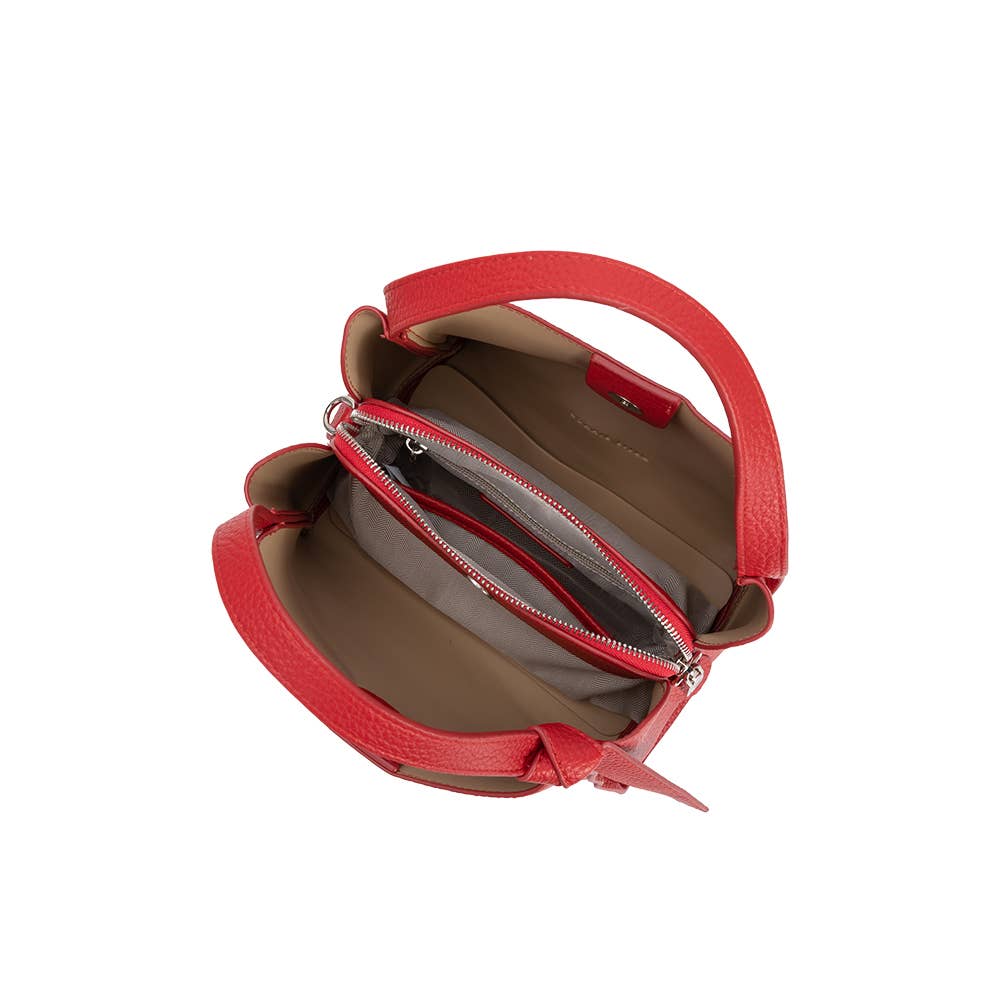 The Felicity Red Recycled Vegan Top Handle Bag is crafted from recycled vegan leather, featuring an open top with two main compartments, a central zippered pocket, and beige-gray lining. Dual side handles complete its eco-friendly look on a simple white backdrop.