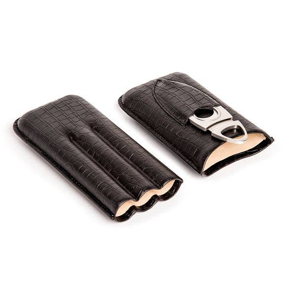 Displayed side by side are two elegant Black Croc Triple Cigar Holders, crafted from genuine leather. The right holder boasts a sleek metal cutter attached to its textured surface, making it an ideal sophisticated gift. Both holders are slightly open, showcasing their plush beige interiors.