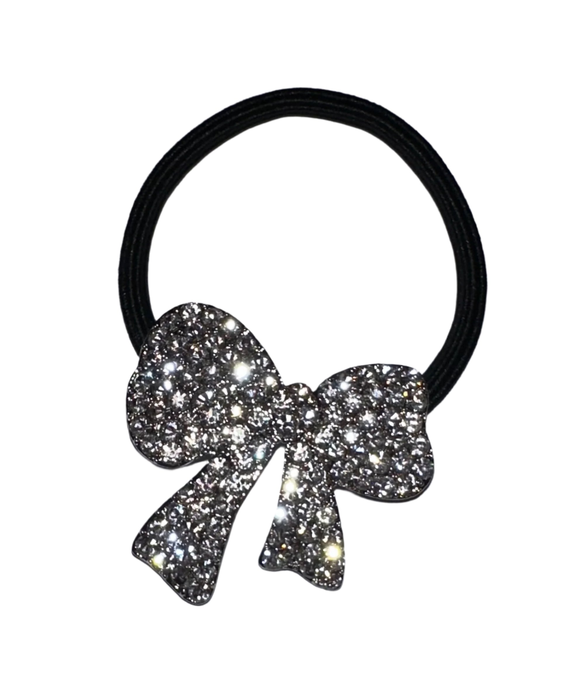 The Sparkly Bow Ponytail Holder features a decorative, rhinestone-studded surface that shimmers in the light, attached to a black elastic band.