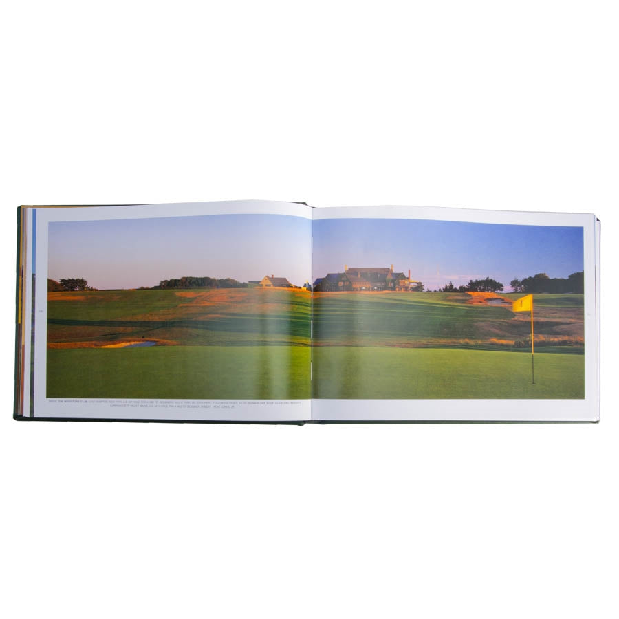 In the open Golf Courses - Fairways of the World - Leather Bound Edition, David Cannon's stunning golf course photography is showcased with a panoramic view of a renowned course at sunset. The landscape reveals immaculate greens with a yellow flag, accompanied by buildings and silhouetted trees set against the warm glow of the clear sky.
