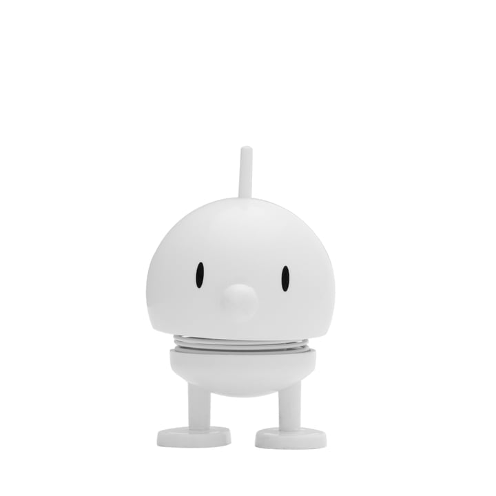 The Hoptimist Bumble is an adorable, round white figure featuring a small antenna, oval eyes, and a dot nose. It stands on two chunky legs with a coil-like body that embodies both the elegance of Danish design history and the playful essence of Hoptimist, making it an ideal addition to any home decor.