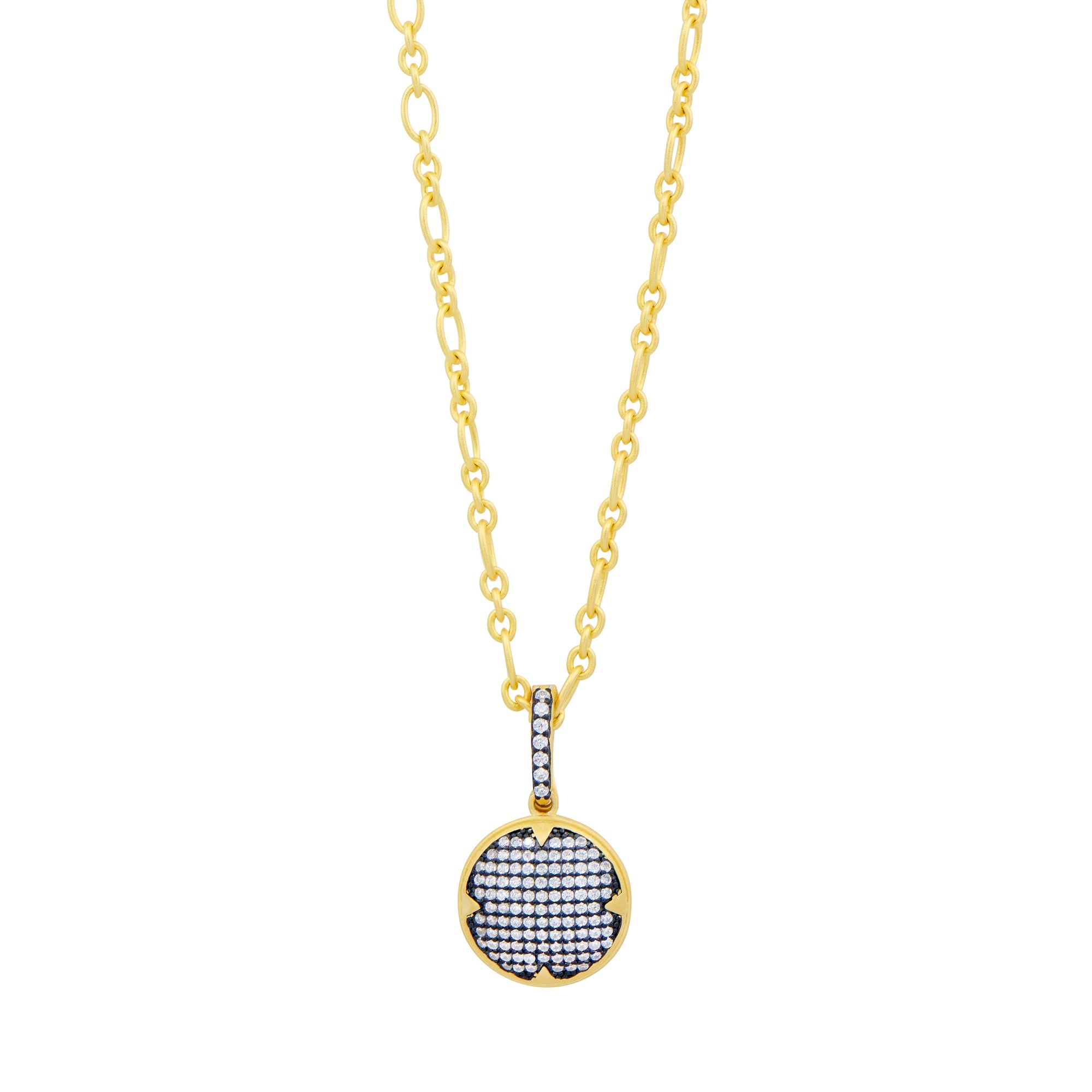 The Signature Times Square Pave Short Pendant is a 14K gold chain necklace showcasing a round pendant encrusted with sparkling cubic zirconia stones. The pendant is outlined in gold, and a vertical line of stones links it to the chain for an elegant touch. Its design is simple yet sophisticated, making it an ideal stylish accessory.