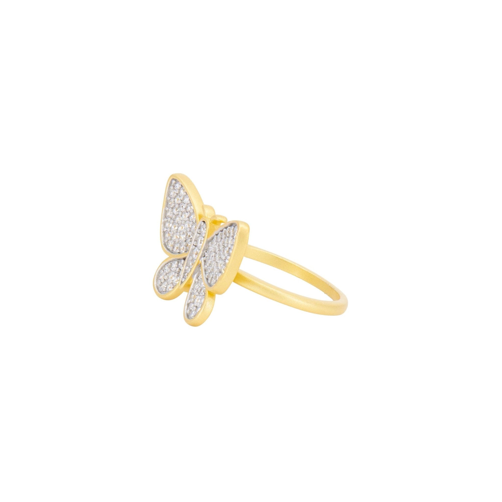 Discover the Butterflies in Bloom Cocktail Ring, a gold masterpiece with an upright butterfly design adorned with sparkling diamonds. Each delicately encrusted wing seamlessly connects to a smooth, glossy band, highlighting the shimmering centerpiece that captivates every gaze.