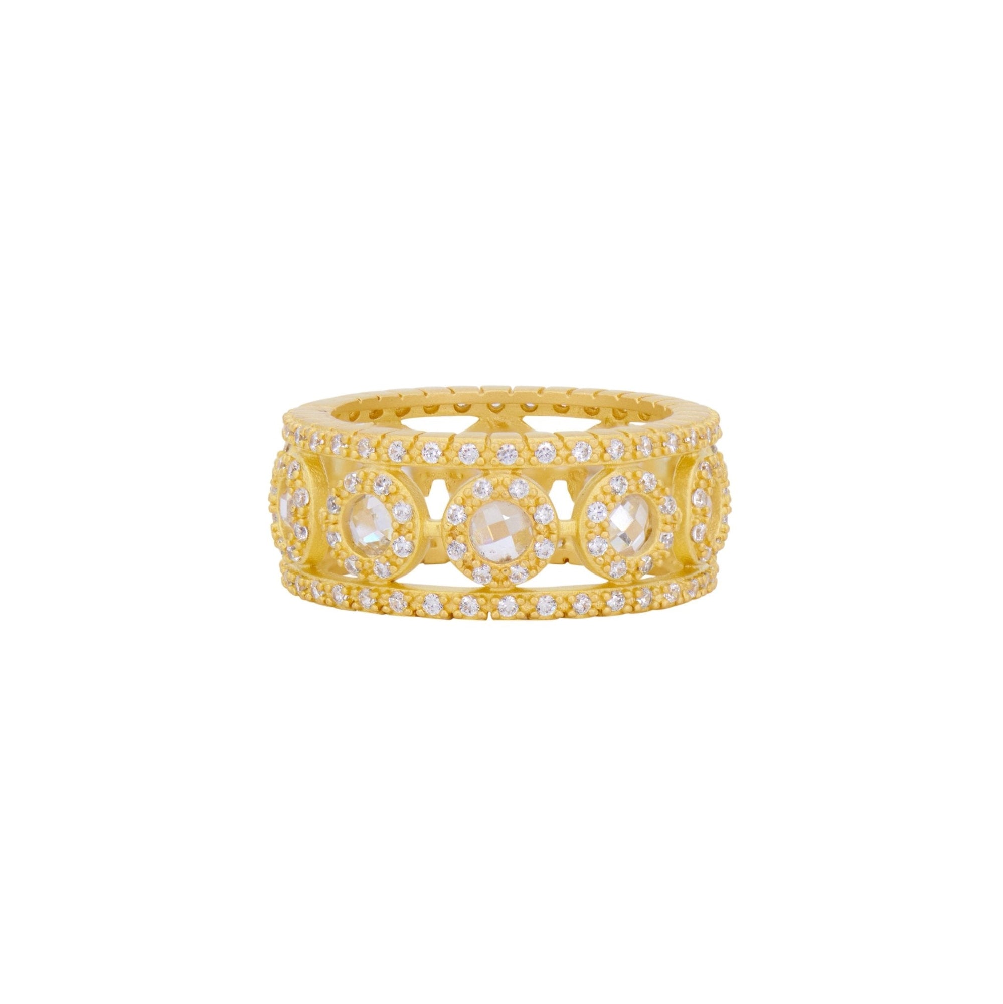 The Kaleidoscope Cutout Cigar Band Ring is an ornate 14K gold piece showcasing intricate designs of rose-cut diamonds encircled by smaller brilliant-cut diamonds in a pavé setting, featuring geometric and symmetrical patterns that exude elegance and luxury.