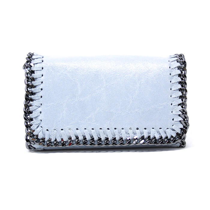 The Leather Crossbody Clutch is a small, light blue leather bag with a metallic chain stitched along the edges for decoration. Its rectangular shape features a glossy finish for added style, and it's photographed against a plain white background.