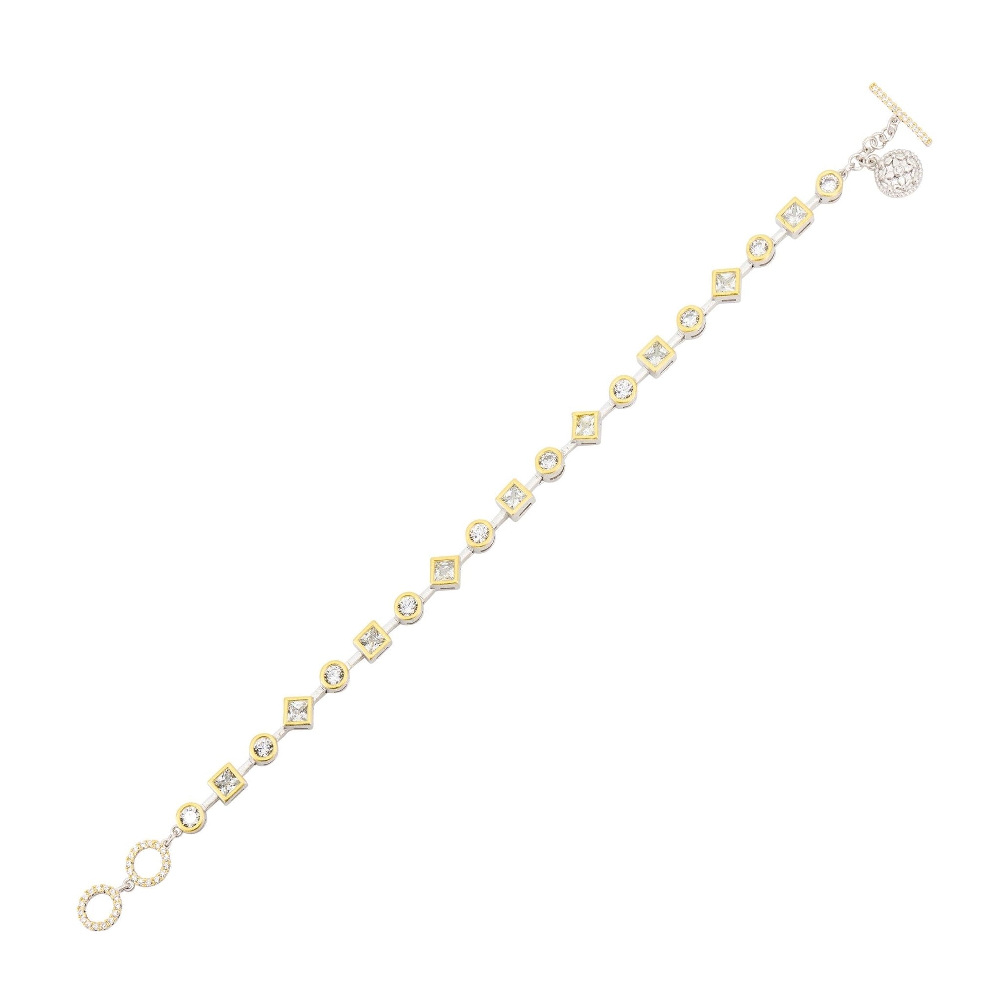 Introducing the Midnight Mosaic Pave Toggle Bracelet, boasting alternating square and round links with geometric-cut stones. Gold-toned links and a silver-toned toggle clasp blend shapes and tones for a luxurious, glamorous look.