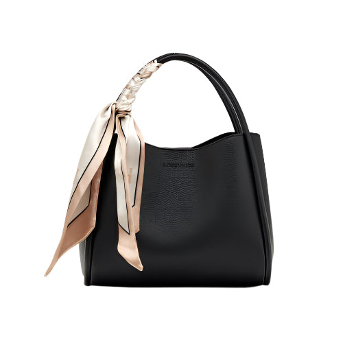 The Steffie Mini Tote Bag is a chic black handbag made from vegan leather, showcasing a sleek, curved design with a structured silhouette. The handle is adorned with a silky scarf in beige and brown patterns, enhancing its elegance. It features a subtle texture against a simple light gray background.