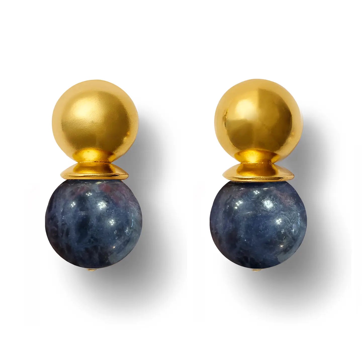 The Gold Lady Earrings are arranged side by side, each showcasing a smooth, gold domed top with a larger, polished Lapis Lazuli gemstone hanging below. Their reflective surfaces create soft shadows against the white background.