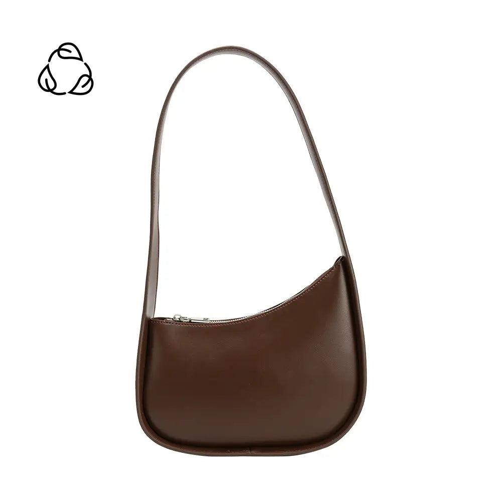 The Willow Recycled Vegan Shoulder Bag is crescent-shaped, with a brown vegan leather exterior and minimalist design. It features a long strap, top zipper closure, and an abstract black logo of three interlocking loops on a white background at the top left corner.