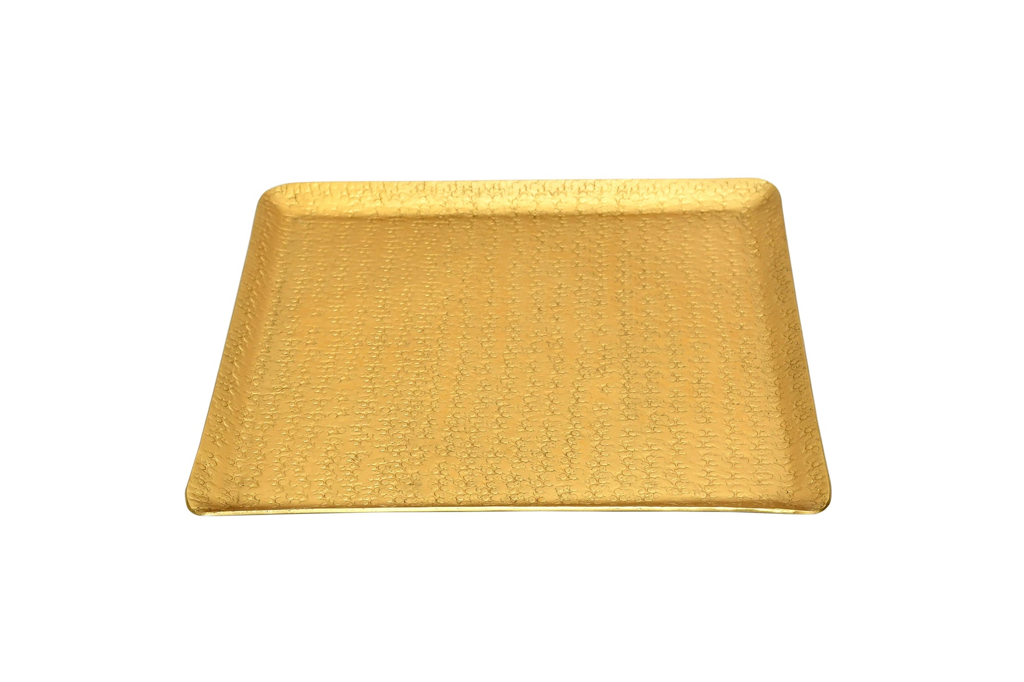Introducing the Gold Aluminum Hammered Square Tray - 11": This tray showcases a textured surface with intricate small criss-cross patterns and boasts slightly raised edges along with a shiny finish, exuding a luxurious appeal. Crafted from sustainable materials, it is designed to be food safe, while the plain white background accentuates its sophisticated design.