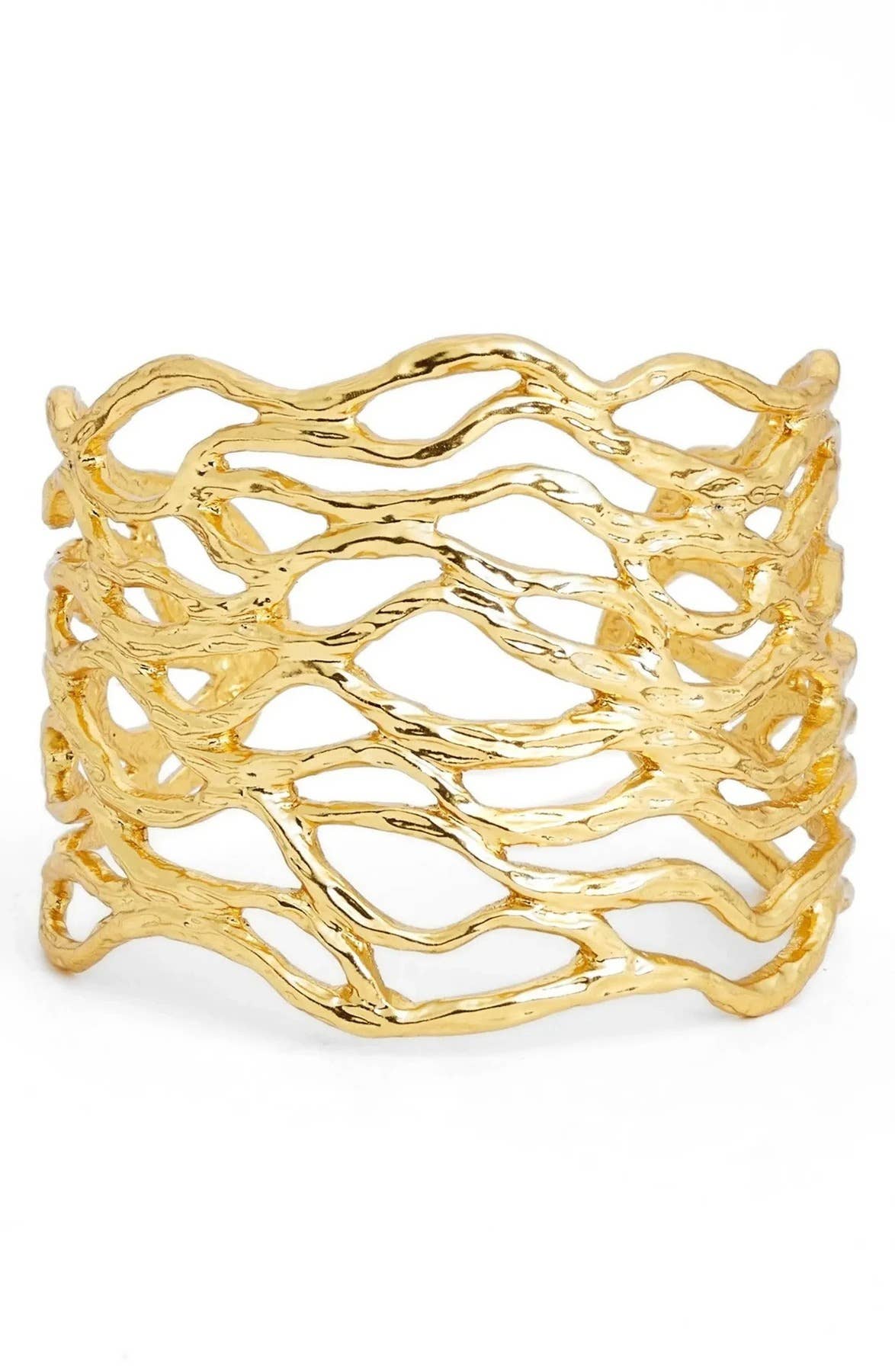 The Openwork Cuff features 24 kt gold plating and a wavy, openwork design that gives it an organic, woven look. Its glossy surface beautifully reflects light, and the interlocking shapes resemble intertwined branches or vines. The adjustable fit ensures comfort for everyone.
