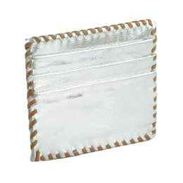 Introducing the Ivy Card Holder, a handmade credit card holder crafted from shiny silver cowhide hairon leather. It features brown stitching along the edges for a contrasting detail to its sleek design. The cardholder includes three horizontal slots for cards, and its reflective surface gives it a metallic appearance.