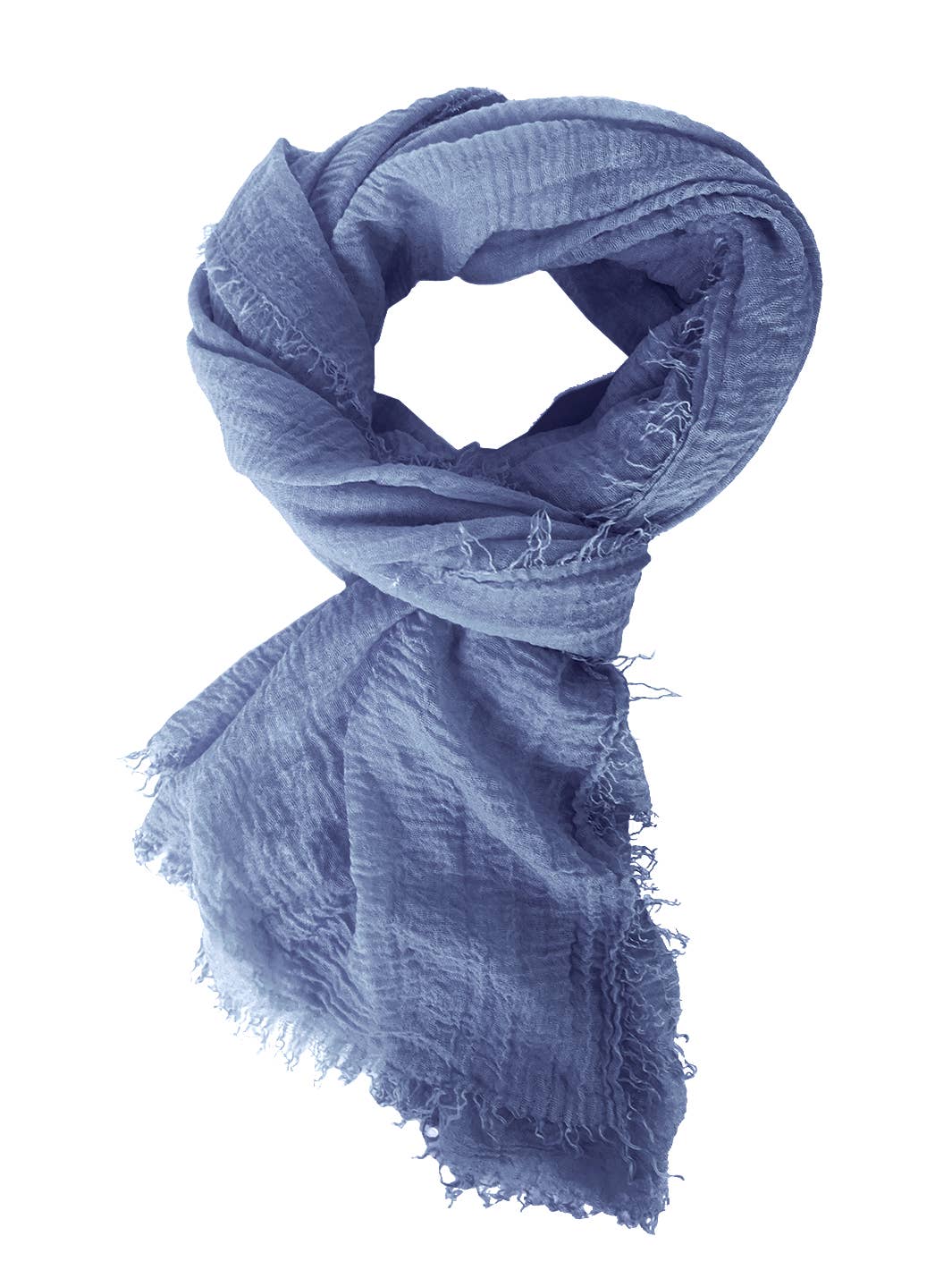 The Boho Scarf is gracefully styled into a relaxed loop, showcasing its light blue hue and crinkled, bohemian design with frayed edges. The fabric exudes a soft and textured feel, complete with visible creases and a subtly sheer look that imparts both a casual and elegant vibe.