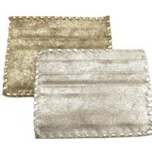 Displayed are two Ivy Card Holders, crafted as rectangular metallic pouches with a textured surface. One is gold and the other silver, both showcasing whipstitch detailing along the edges for a handcrafted look. These pouches resemble lightly padded or cushioned handmade credit card holders.