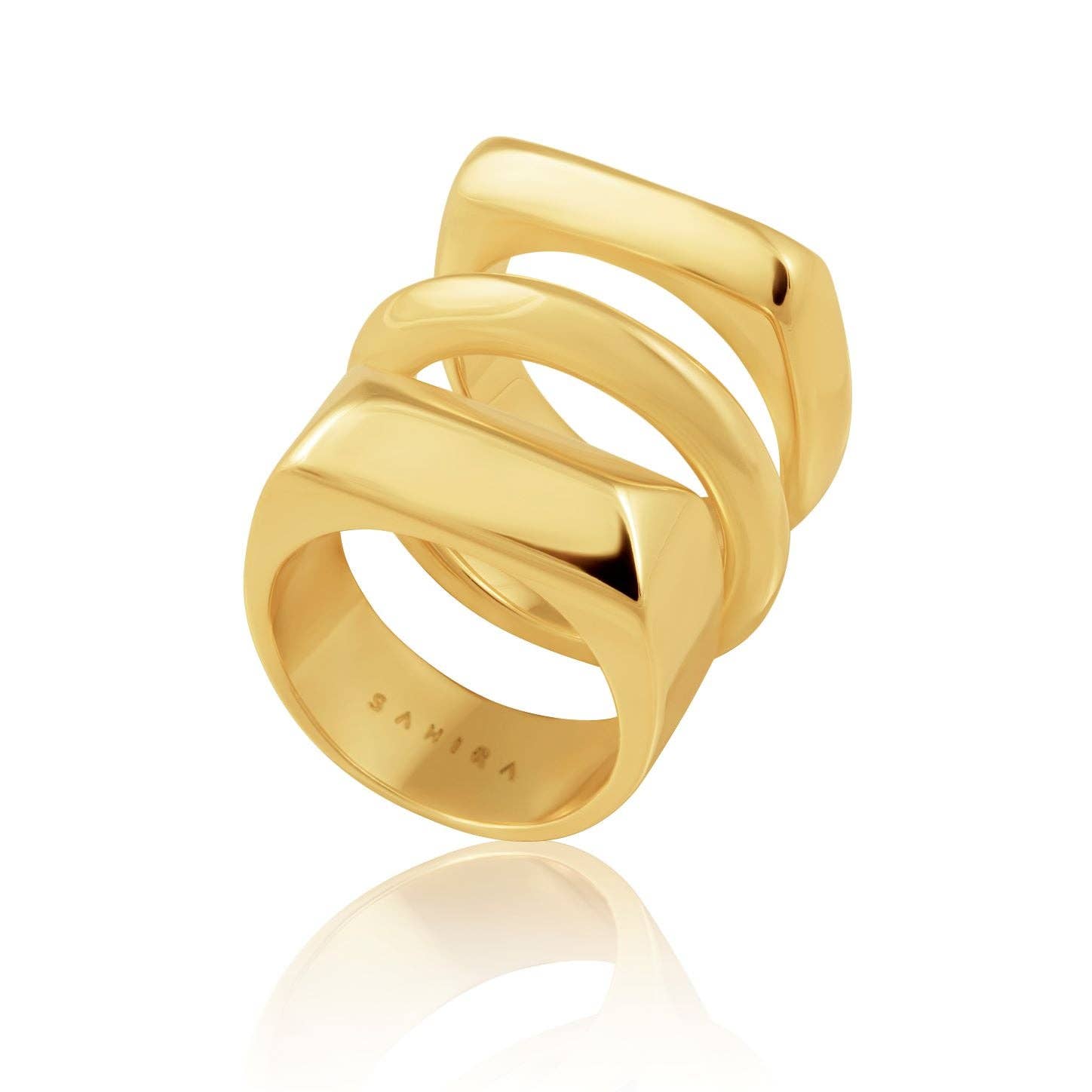 The Nova Ring Set is a polished, reflective assembly of interconnected square-shaped bands with sleek 18k gold plating. The inside is engraved with "Sahira," and the geometric stacked design is artfully displayed upright against a white background.