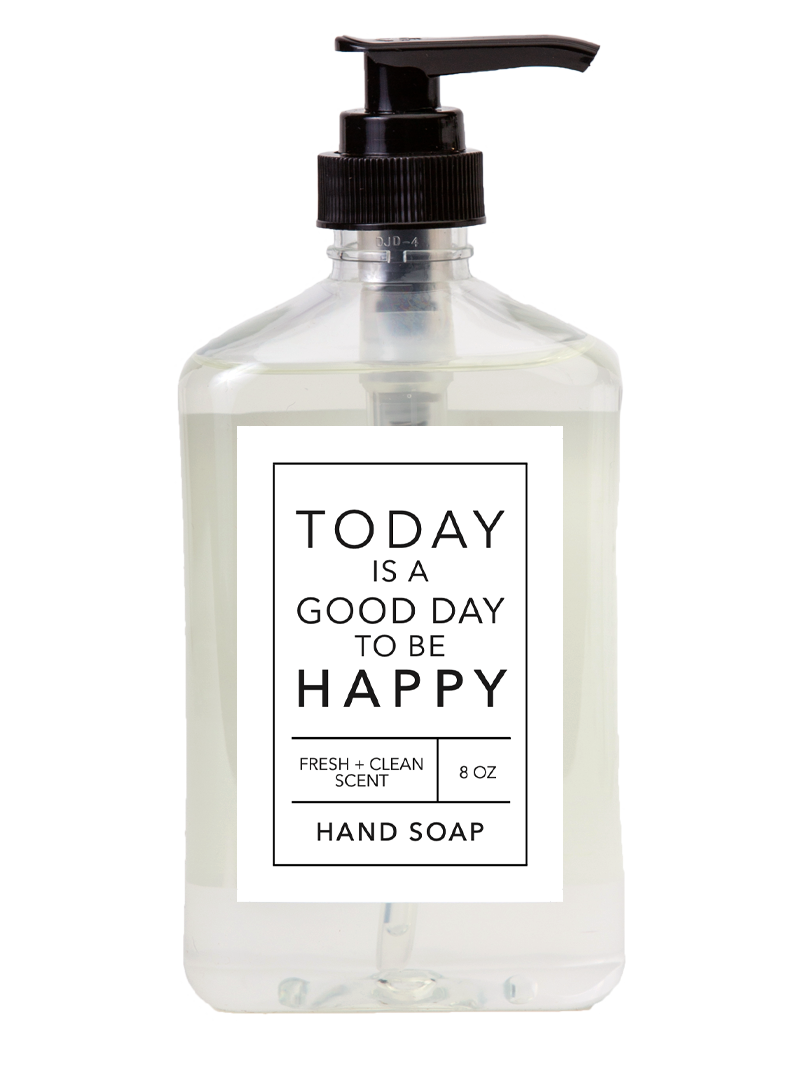 A clear pump bottle of "Happy" Hand Soap features a white label. The text on the label states, "Today is a good day to be happy" in bold letters, accompanied by "Fresh + Clean Scent" and "8 oz Hand Soap." The bottle holds a colorless liquid soap.