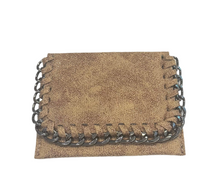 Load image into Gallery viewer, Product Description: The Chain Wallet features a brown textured design with silver chain detailing along the edges, creating a decorative border around the front flap for a unique and stylish appearance. Its rustic, vintage appeal is accentuated by the slightly pebbled surface, making it the perfect size for everyday use.
