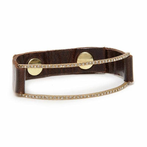 The Pave Open Rectangle Leather Bracelet in Gold Finish showcases a two-row design with sparkling black diamond crystals on dark brown leather. Featuring two large 18K gold snaps, it blends rustic charm with glamour for a stylish, functional look.