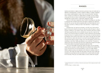 Load image into Gallery viewer, A bearded mixologist in a white shirt pours a light brown liquid into an upside-down glass, with a small ceramic pitcher nearby. The background is blurred. On the right page of *The Bartender&#39;s Manifesto*, there is text titled &quot;RINSES&quot; discussing the use of liquids like absinthe in cocktails, accompanied by a footnote on bartending techniques.
