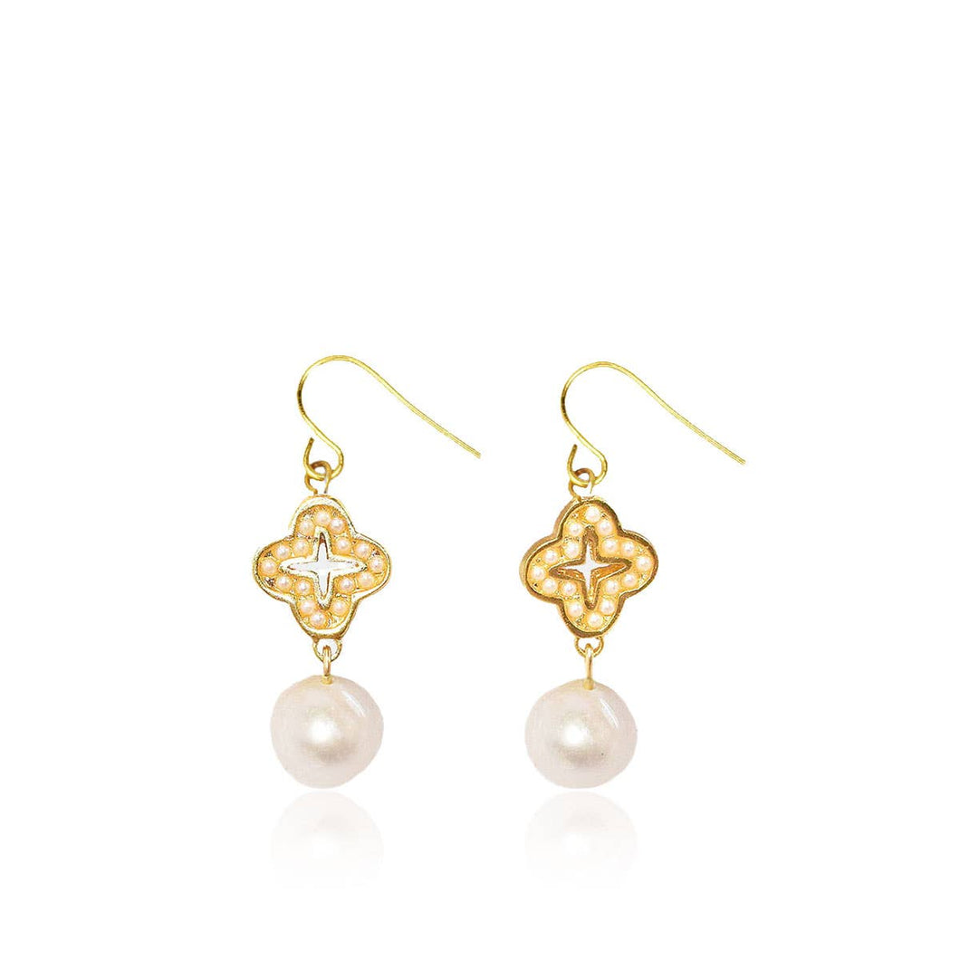 The Pearl and Clover Dangle Earrings are a sophisticated pair of jewelry pieces, showcasing gold quatrefoil shapes with intricate detailing. Each design is embellished with small freshwater pearls, and beneath each quatrefoil, a round, lustrous pearl elegantly hangs. These gold-plated earrings feature hooks for easy wearing, blending classic and modern styles gracefully.