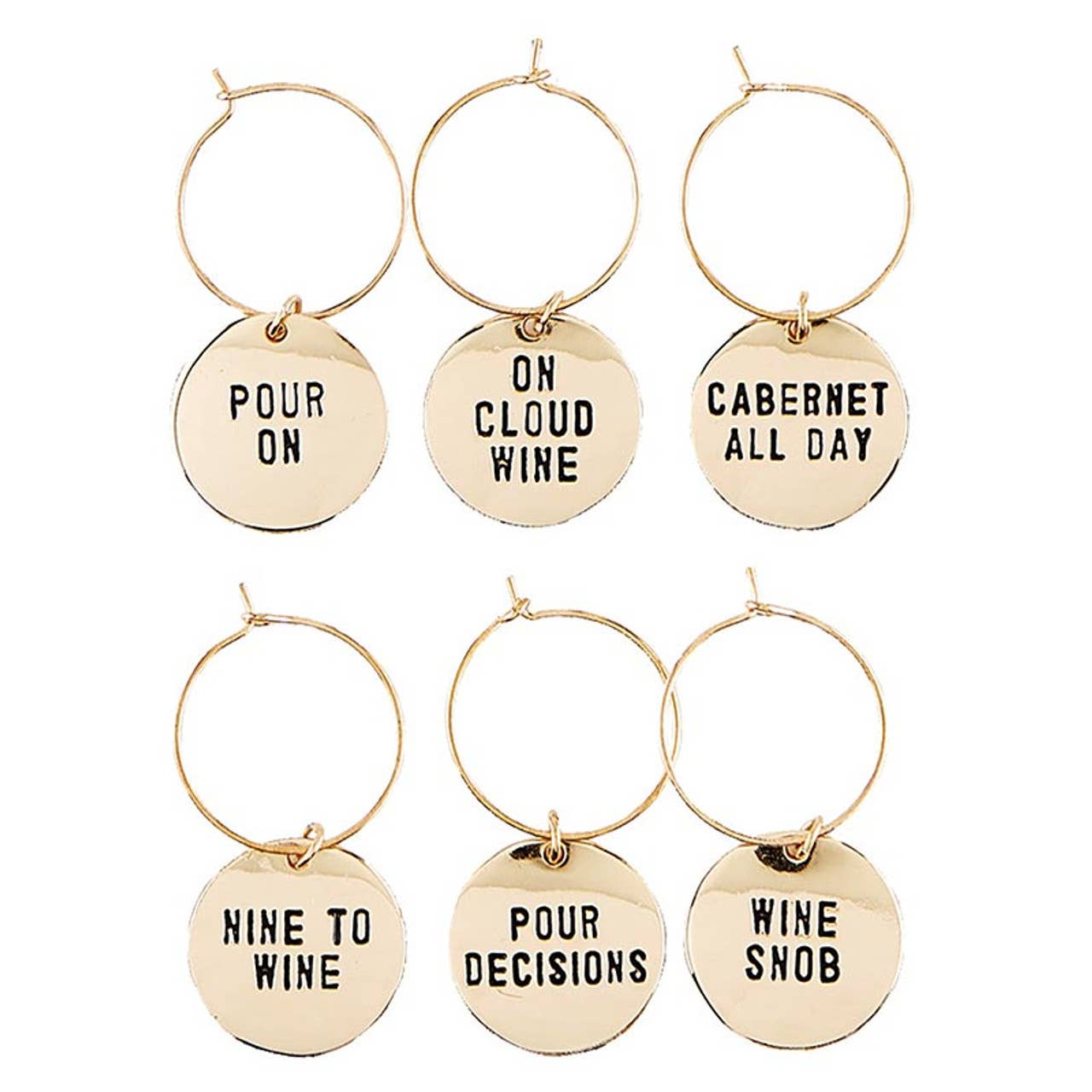 The Gold Wine Charms in Pine Box - Wine Tasting Daily set includes six playful charms, ideal for gifts. Featured phrases: "POUR ON," "ON CLOUD WINE," "CABERNET ALL DAY," "NINE TO WINE," "POUR DECISIONS," and "WINE SNOB." Each disk is elegantly attached to a hoop.
