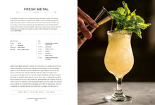 Load image into Gallery viewer, On the left page, &quot;Fresh Metal,&quot; a cocktail recipe crafted by a talented mixologist, includes ingredients and step-by-step instructions from *The Bartender&#39;s Manifesto*. On the right page, a close-up image showcases a yellow drink in a cocktail glass garnished with mint sprigs. A hand expertly pours liquid from a small glass into the drink, demonstrating skilled bartending techniques.
