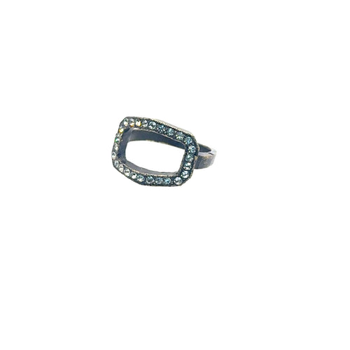 The Open Rectangle Pave Ring is handcrafted in Brooklyn, featuring a rectangular open center. A silver frame is embellished with sparkling clear stones, forming a decorative border. Its simple band highlights the stone-studded rectangular design.