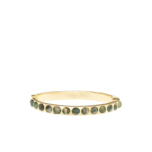 Load image into Gallery viewer, The Semi Precious Stone Bangle is a sleek and elegant hinged bracelet, adorned with evenly spaced round green semi-precious stones, encircling the wrist with a 6 1/4&quot; circumference. Inside, it features an engraved logo or text that enhances its sophisticated design.
