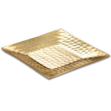 Load image into Gallery viewer, In the center of the image is a square gold-colored metal plate known as the Gold Hammered Tray - 6”. It features a hammered texture, slightly raised edges, and a reflective surface that gives it an appearance of slight waviness. The background is plain and white.
