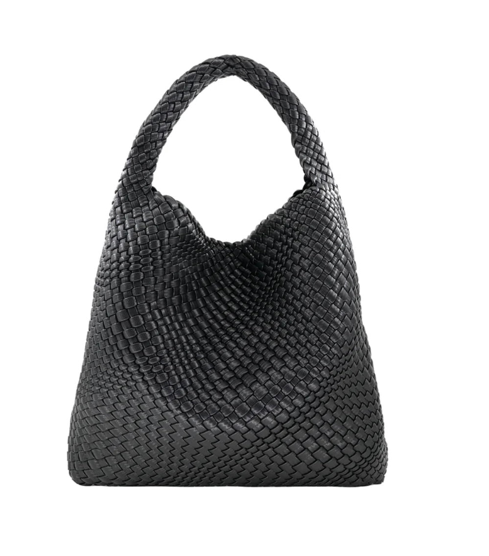 The Woven Bag (Bag in a bag), featuring a black woven PU material, is displayed against a plain white background. Its hobo shape and single strap add to its aesthetic appeal. The textured pattern sprawls dynamically across the bag's surface, while the seamlessly connected strap enhances its streamlined silhouette.