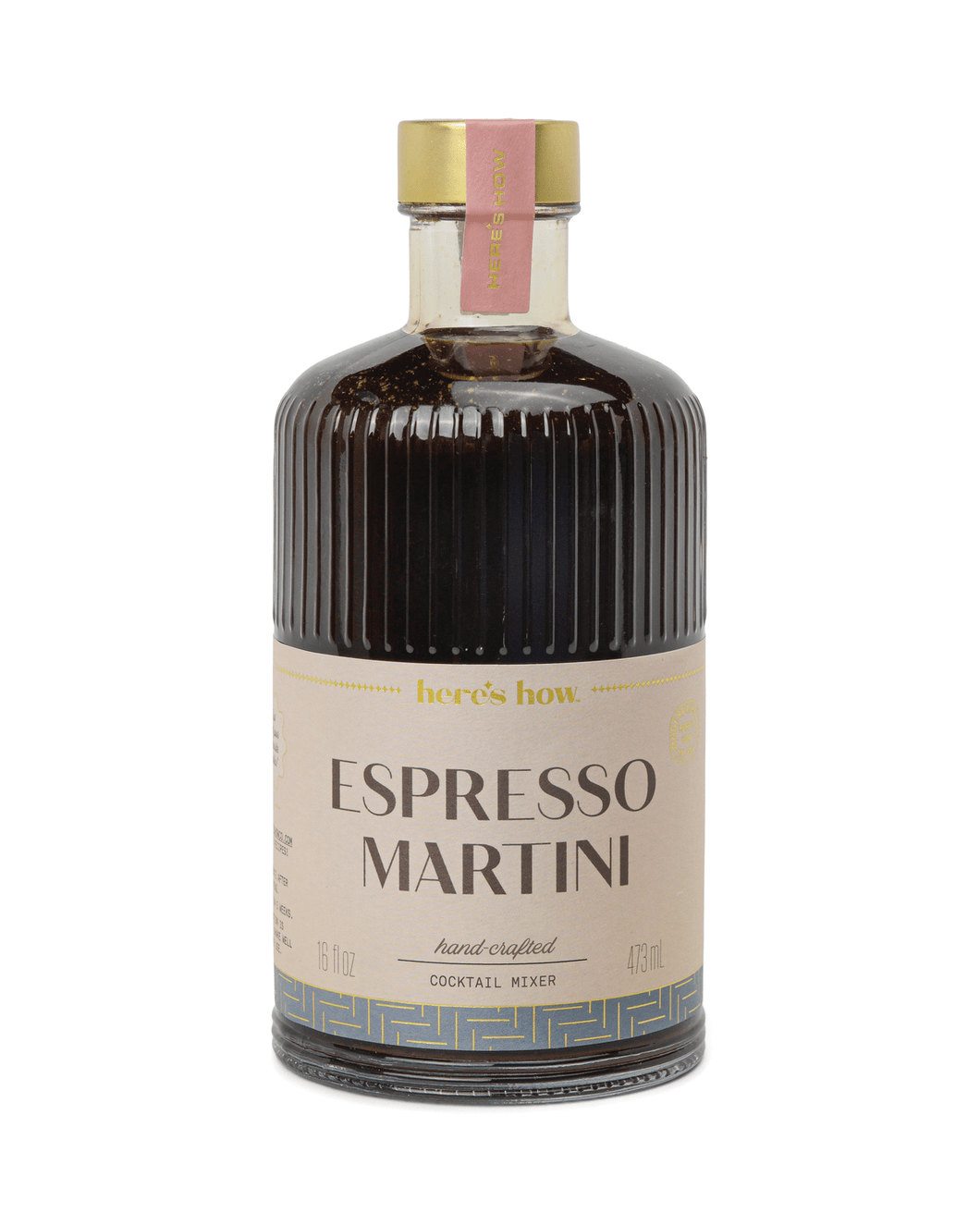 A 473 ml bottle of the Espresso Martini Mixer showcases a ribbed dark brown glass design with a beige label that reads 