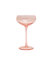 Load image into Gallery viewer, The Lou Coupe Glass, available as a set of 2, features a mood-boosting pink glass design. Each coupe has a round, wide bowl atop a slender stem with a circular base. Its smooth, semi-transparent texture and slightly reflective surface make it ideal for showcasing craft cocktails against a plain white background.
