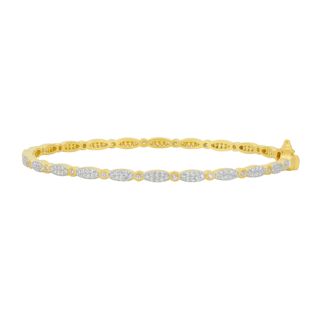 Introducing the Marquis Pave Thin Hinge Bangle, a 14K gold bracelet showcasing an elegant alternating pattern of oval links, each adorned with small, sparkling diamonds. The marquise hinge bangle design and clasp closure enhance its sleek elegance, while a polished finish accentuates its luxurious appearance.