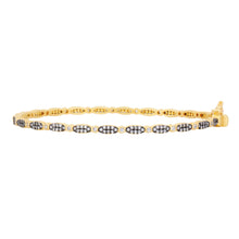 Load image into Gallery viewer, Presenting the Marquis Pave Thin Hinge Bangle: a sophisticated 14K gold bracelet featuring a stunning arrangement of dark stones and small cubic zirconia gems. The design showcases alternating oblong and circular patterns, with intricate detailing on both the exterior and interior. This elegant bangle is completed with a secure clasp for added peace of mind.
