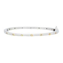 Load image into Gallery viewer, The Thin Bezel Stacking Bangle is a silver circular bracelet adorned with small, round yellow and white gemstones that mimic the look of cubic zirconia stones, evenly spaced along its surface. The inside is engraved with &quot;925 FR,&quot; and it boasts a sleek, polished finish along with a small clasp.
