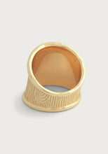 Load image into Gallery viewer, The Enchanted Forest Bark Ring is a beautiful piece crafted from 18k gold, featuring a wide band with a woodgrain motif that adds an organic touch to its design. The exterior displays this unique pattern, while the smooth interior is engraved with an identification and the number &quot;7,&quot; standing elegantly against a light background.
