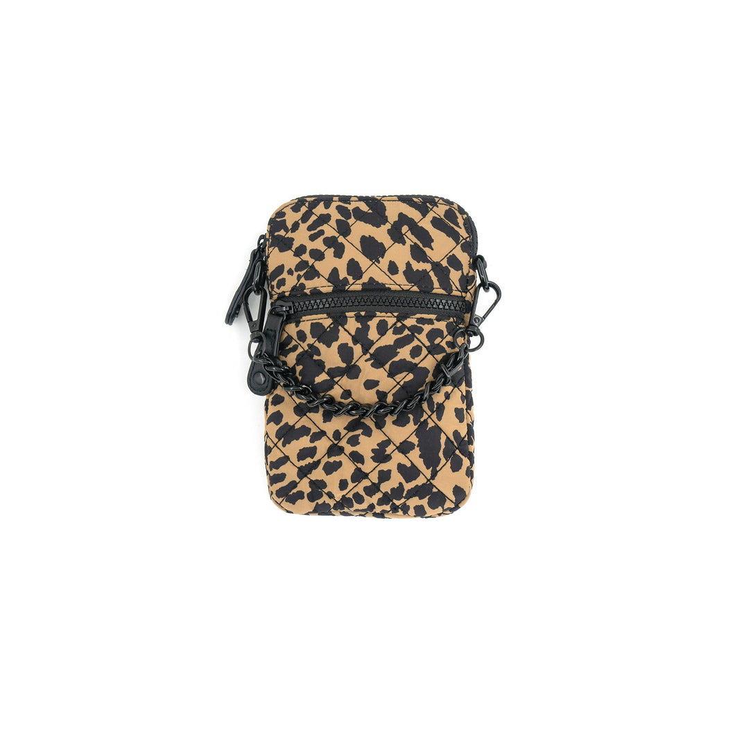 Introducing the Quilted Cellphone Bag: a rectangular accessory adorned with a beige and black leopard print, complete with a front zipper pocket. This bag includes a black detachable strap secured by clasps on both ends and is expertly crafted from durable nylon material, presented laid flat against a white background.