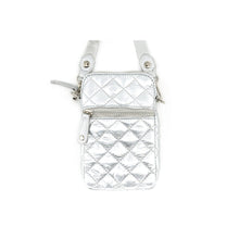 Load image into Gallery viewer, Introducing the Quilted Cellphone Bag: a compact and stylish metallic silver accessory crafted from durable nylon. It features a modern quilted diamond pattern, a convenient front zipper pocket, and two eye-catching silver buttons at the strap attachment points. Its adjustable strap ensures it&#39;s both sleek and versatile for any occasion.
