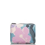 Load image into Gallery viewer, The Aloha Pouches are small, rectangular toiletry pouches with top zippers and a floral design featuring large pink flowers and dark leaves on a light blue background—ideal for vibrant travel companions.
