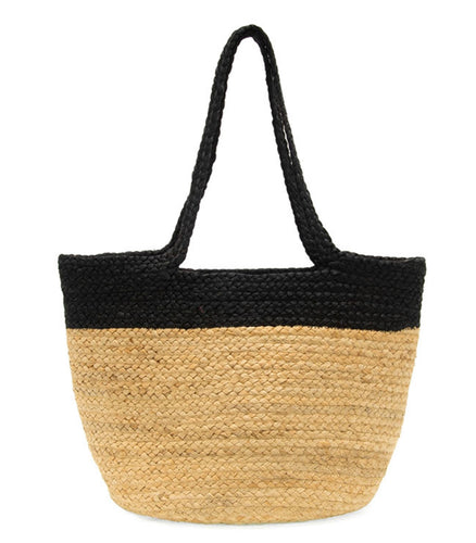 The Phoebe Jute Tote Bag showcases black handles and a sleek black upper, paired with a natural straw body. Its slightly rough texture and open-top design offer spaciousness, while a detachable vegan leather shoulder strap adds versatility.