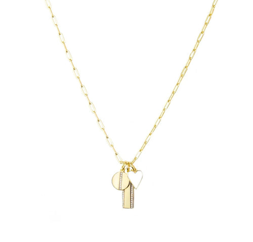 The Multi Charm Necklace features a gold-plated chain with an elongated sterling link design, elegantly displaying three simple charms: a small round disk, an upright rectangular pendant, and a heart. These charms hang closely together at the center, adding delicate refinement.