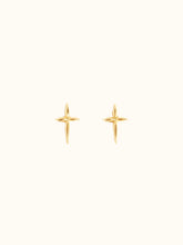 Load image into Gallery viewer, A pair of Droplet Cross Studs, minimalist vermeil stud earrings shaped as small, angular crosses on a plain off-white background. Handmade in Nashville, they feature a polished finish that exudes a subtle shine. The studs are symmetrically positioned to showcase their intricate detailing.
