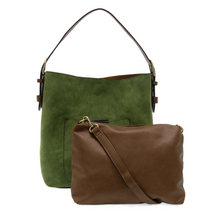 Load image into Gallery viewer, The Hobo 2 in 1 Faux Suede Handbag features a green faux suede hobo tote with a dark shoulder strap and a front pocket, paired with a brown vegan leather crossbody bag that includes a matching removable strap, stylishly positioned in front of the tote to highlight their complementary design and texture.
