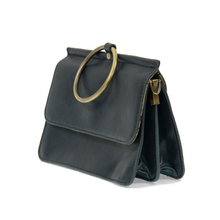 Load image into Gallery viewer, The Aria Ring Bag - Fall/Winter is a chic dark blue vegan leather bracelet bag characterized by its sleek design. It boasts a prominent gold ring handle, a fold-over flap, and elegant gold clasp details. With its structured shape, this medium-sized bag delivers both elegance and functionality, making it ideal for casual or formal events.
