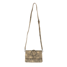 Load image into Gallery viewer, Presenting the Aria Ring Bag - Fall/Winter: a compact crossbody bag in a brown snakeskin pattern, made from vegan leather. It has a long adjustable strap and is highlighted by a front flap closure with a circular metal accent. The bag is showcased against a plain white background.
