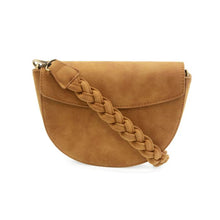 Load image into Gallery viewer, The Luna Crescent Crossbody with Braided Handle is a tan suede bag featuring a smooth, rounded bottom and a flap closure. It includes a wide, braided shoulder strap attached by gold hardware, offering a soft and luxurious texture that conveys a stylish and sophisticated look.
