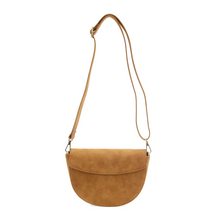 Load image into Gallery viewer, The Luna Crescent Crossbody with Braided Handle is a brown vegan suede leather bag featuring a half-moon shape and an adjustable long strap. It includes a flap closure along with metal clasps that attach the strap to the bag. Its simple and elegant design makes it perfect for casual or semi-formal occasions.
