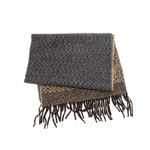 Load image into Gallery viewer, The Cozy Scarves product is a folded, two-toned wool scarf that showcases a warm, mottled pattern in dark gray and brown. It features fringed tassels on one end of the soft brown section, enhancing its texture and contrast. The scarf is set against a plain, white background.
